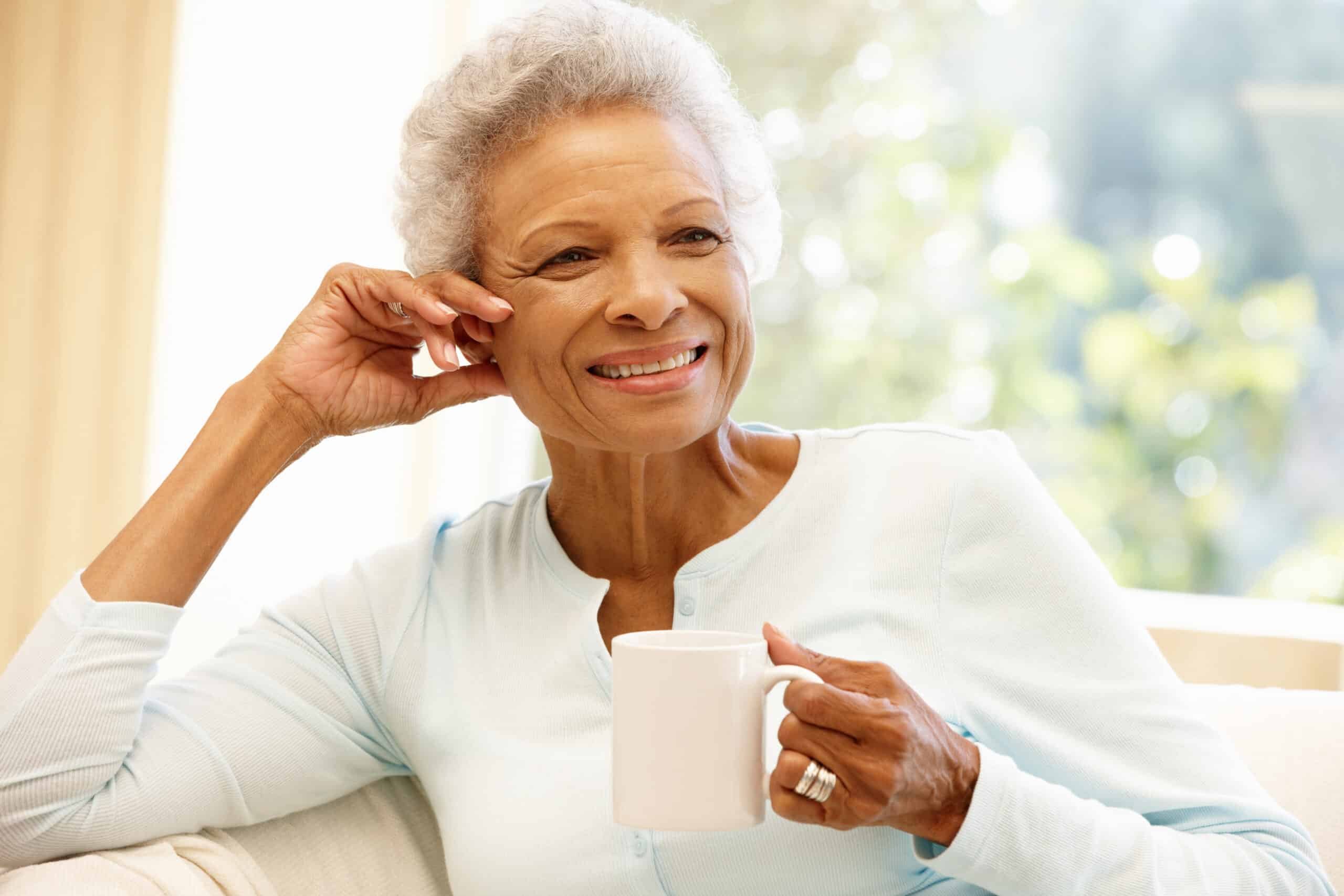 Senior woman relaxing with coffee mug